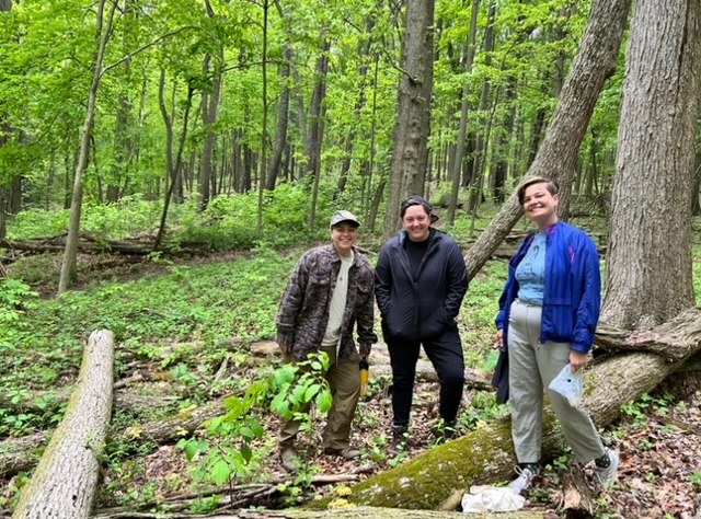 Friends (from left): Rikki Moss, Elize Jekabson, and Larisa Medne foraging for morels in spring. Ann Arbor, Michigan.