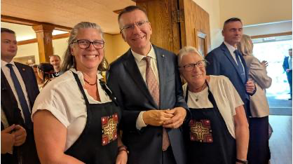 From the left: Daina Gulbe, the President of the Republic of Latvia, Dace Gulbe.