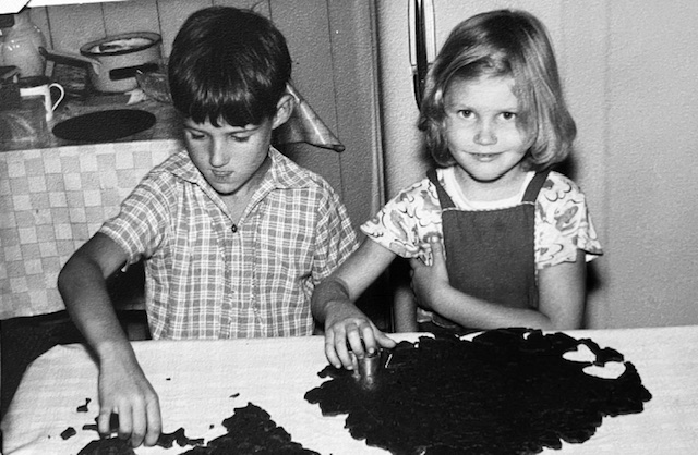 Maija: Me and my friend Maris helping to make piparkukas at Christmas, in 1956, when I was 6 years old.